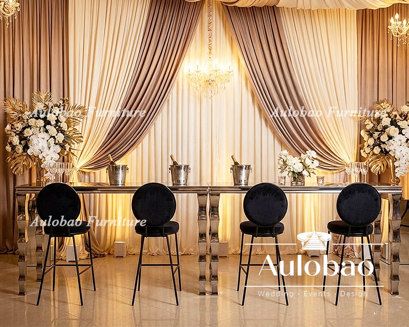 Bamboo-Legged Bar Table and Round-Backed Bar Stools